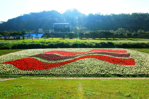 欣賞美麗花海之余別忘了留影紀念。（圖片來源／台北市觀光局）